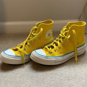 Converse Chuck Taylor 70’s. yellow with blue soles and tracing. very gently worn
